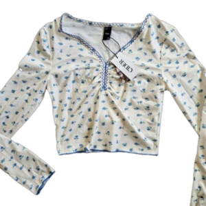 CIDER Blue ditzy floral long sleeve ruched top